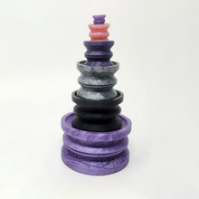 Load image into Gallery viewer, A stack of Double-Sided Suction Cups from Legendary to mini Charm on a white background.