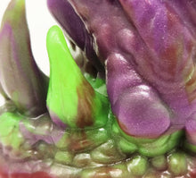 Load image into Gallery viewer, Closeup of the base teeth area of a three color marble "Doomstick" tentacle themed adult toy on a white background.