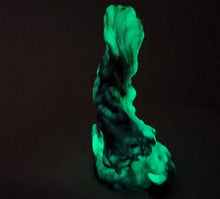 Load image into Gallery viewer, Photo featuring the glow in the dark of the three color marble &quot;Doomstick&quot; tentacle themed adult toy shown from the side.
