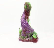 Load image into Gallery viewer, A three color marble "Doomstick" tentacle themed adult toy shown from the side on a white background.