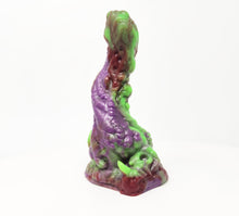 Load image into Gallery viewer, A three color marble "Doomstick" tentacle themed adult toy shown from the side on a white background.