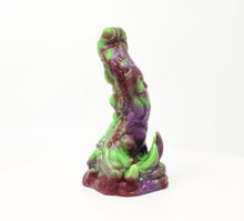Load image into Gallery viewer, A three color marble "Doomstick" tentacle themed adult toy shown from the side on a white background.