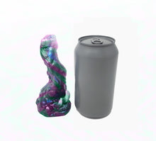 Load image into Gallery viewer, Mock up of a three color Doomstick adult toy next to a soda can for scale on a white background.
