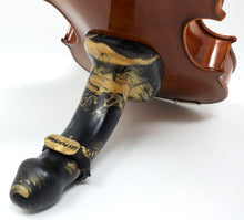Load image into Gallery viewer, A FEMDOM insertable adult toy in "Night at the Opera" with a body band attached by the built-in suction cup base to the underside of a violin on a white background