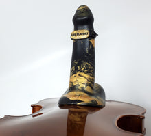 Load image into Gallery viewer, A FEMDOM insertable adult toy in "Night at the Opera" with a body band attached by the built-in suction cup base to an upside down violin on an off-white background