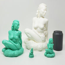 Load image into Gallery viewer, Three size prototype models and mini charm of the figure side of Jasmine&#39;s Garden penetratable with a standard soda can for scale on an off white background
