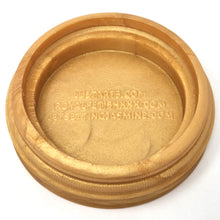 Load image into Gallery viewer, Top view of the inside of the gold base stand for Jet Setting Jasmine's penetratable silicone toy, Jasmine's Garden. The websites for Lust Arts, Royal Fetish Films, and Jet Setting Jasmine.