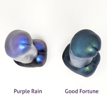 Load image into Gallery viewer, Top above view of two King Noire dual-density insertable adult toys on an off white background