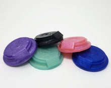 Load image into Gallery viewer, Five silicone density sample shapes from Lust Arts in a range of colors