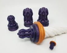 Load image into Gallery viewer, Four different sizes of Thruster Suction Cup Handles with one attached to the base of a Unicorn Horn insertable toy on a white background, mini handle and Unicorn charm in front
