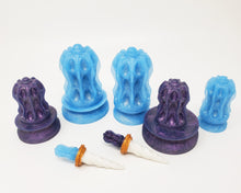 Load image into Gallery viewer, Five different size combinations of Thruster Suction Cup Handles on a white background, two mini handles and Unicorn charms in front