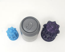 Load image into Gallery viewer, Angled top down view of a Medium size Thruster handle and a Large size Thruster handle on Epic suction base sizes next to a soda can for scale on a white background