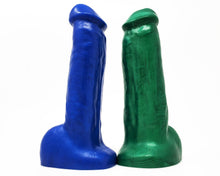 Load image into Gallery viewer, Two solid color King Noire toys in Electric Blue and Money Green
