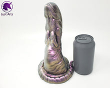 Load image into Gallery viewer, A Lust Burster insertable sits next to a soda can on a white background.