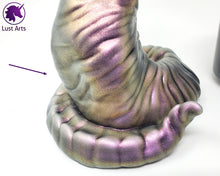 Load image into Gallery viewer, A Lust Burster insertable sits next to a soda can on a white background. This is a closer view of the flaw in the base. It is hard to notice on the toy, but is a shallow dent near the base.