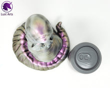 Load image into Gallery viewer, A Lust Burster insertable sits next to a soda can on a white background.