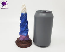 Load image into Gallery viewer, Photo of a Unicorn Horn insertable toy next to a soda can for scale on an off-white background
