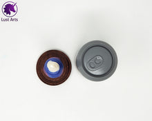 Load image into Gallery viewer, Photo of a Unicorn Horn insertable toy next to a soda can for scale on an off-white background