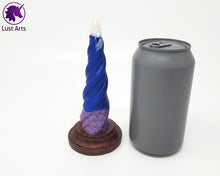 Load image into Gallery viewer, Photo of a Unicorn Horn insertable toy next to a soda can for scale on an off-white background
