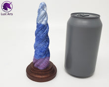 Load image into Gallery viewer, Photo of a Unicorn Horn insertable toy next to a soda can for scale on an off-white background