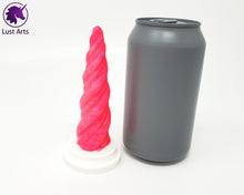 Load image into Gallery viewer, Photo of a Unicorn Horn insertable toy next to a soda can for scale on an off-white background