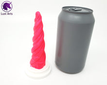 Load image into Gallery viewer, Photo of a Unicorn Horn insertable toy next to a soda can for scale on an off-white background