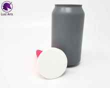 Load image into Gallery viewer, Photo of a Unicorn Horn insertable toy next to a soda can for scale on an off-white background