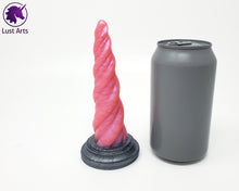 Load image into Gallery viewer, Photo of a Unicorn Horn insertable toy next to a soda can for scale on an off-white background