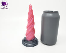 Load image into Gallery viewer, Photo of a Unicorn Horn insertable toy next to a soda can for scale on an off-white background