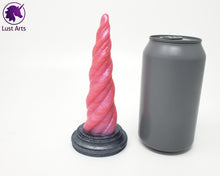 Load image into Gallery viewer, Photo of a Unicorn Horn insertable toy next to a soda can for scale on an off-white background
