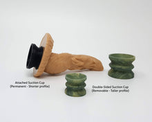 Load image into Gallery viewer, Lust Burster fantasy adult toy on its side with an Attached Suction Cup next to two Double-Sided Suction Cups