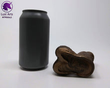 Load image into Gallery viewer, A Frank's Monster insertable sits next to a soda can on a white background.