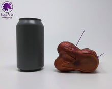 Load image into Gallery viewer, A Frank's Monster insertable sits next to a soda can on a white background.