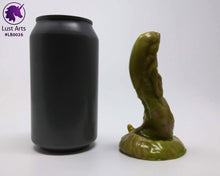 Load image into Gallery viewer, Photo of a Lust Burster insertable toy next to a soda can for scale on an off-white background