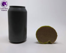 Load image into Gallery viewer, Photo of the underside of a Lust Burster insertable toy next to a soda can for scale on an off-white background
