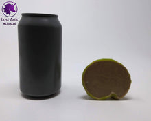 Load image into Gallery viewer, Photo of the underside of a Lust Burster insertable toy next to a soda can for scale on an off-white background