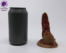 Load image into Gallery viewer, Photo of a Lust Burster insertable toy next to a soda can for scale on an off-white background