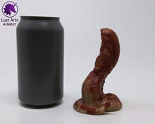 Load image into Gallery viewer, Photo of a Lust Burster insertable toy next to a soda can for scale on an off-white background