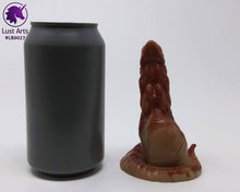 Load image into Gallery viewer, Photo of a Lust Burster insertable toy next to a soda can for scale on an off-white background