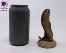 Load image into Gallery viewer, Photo of a Lust Burster insertable toy next to a soda can for scale on an off-white background