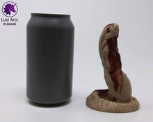 Load image into Gallery viewer, Photo of a Lust Burster insertable toy next to a soda can for scale on an off-white background
