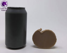 Load image into Gallery viewer, Photo of a Lust Burster insertable toy next to a soda can for scale on an off-white background