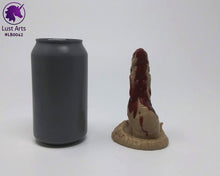Load image into Gallery viewer, Photo of a Lust Burster insertable toy next to a soda can for scale on an off-white background