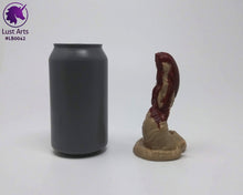 Load image into Gallery viewer, Photo of a Lust Burster insertable toy next to a soda can for scale on an off-white background