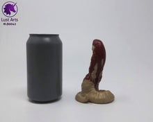 Load image into Gallery viewer, Photo of a Lust Burster insertable toy next to a soda can for scale on an off-white background
