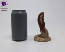 Load image into Gallery viewer, Photo of a Lust Burster insertable toy next to a soda can for scale on an off-white background