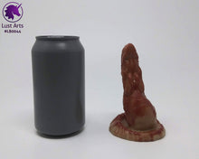 Load image into Gallery viewer, Photo of a Lust Burster insertable toy next to a soda can for scale on an off-white background
