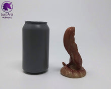 Load image into Gallery viewer, Photo of a Lust Burster insertable toy next to a soda can for scale on an off-white background