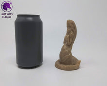 Load image into Gallery viewer, Photo of a Lust Burster insertable toy next to a soda can for scale on an off-white background