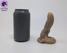 Load image into Gallery viewer, Photo of a Lust Burster insertable toy next to a soda can for scale on an off-white background